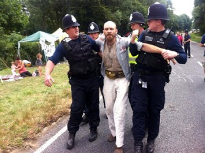 A protestor is removed by police. Photo Frack-Off
